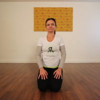 Young woman sitting on yoga pose | Santosh Yoga Institute in Salt Lake City, UT