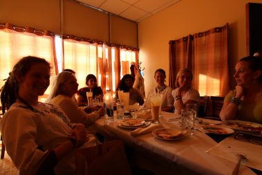 Group of Young people enjoying while eating lunch | Santosh Yoga Institute in Salt Lake City, UT