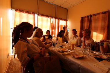 Group of Young people enjoying while eating lunch | Santosh Yoga Institute in Salt Lake City, UT