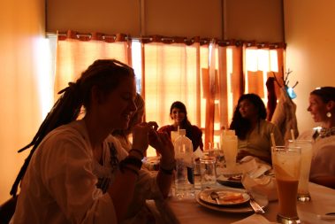 Group of Young people enjoying while eating lunch | Santosh Yoga Institute in Salt Lake City, UT