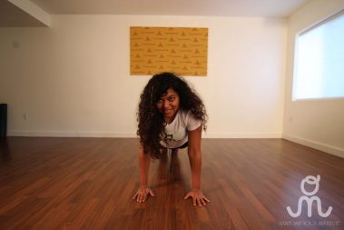 Flexible young woman practicing yoga | Santosh Yoga Institute in Salt Lake City, UT
