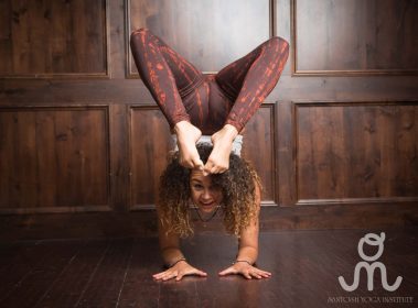 Flexible young woman practicing yoga | Santosh Yoga Institute in Salt Lake City, UT