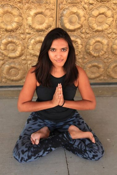 Young woman doing meditation yoga | Santosh Yoga Institute in Salt Lake City, UT
