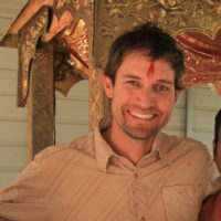 Young happy man photo | Santosh Yoga Institute in Salt Lake City, UT