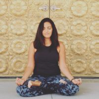 Young woman doing meditation yoga | Santosh Yoga Institute in Salt Lake City, UT