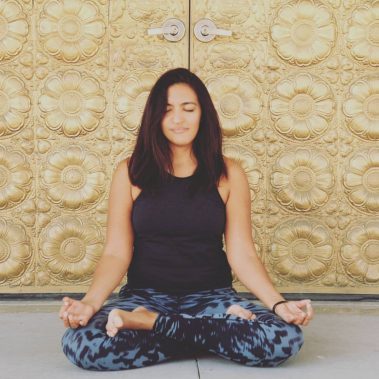 Young woman doing meditation yoga | Santosh Yoga Institute in Salt Lake City, UT