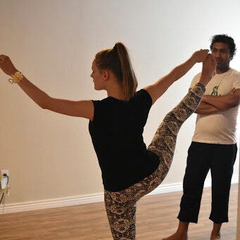 Young Woman Practicing Yoga | Santosh Yoga Institute in Salt Lake City, UT