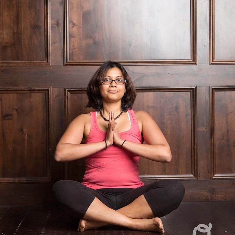 Young Woman Practicing Yoga | Santosh Yoga Institute in Salt Lake City, UT