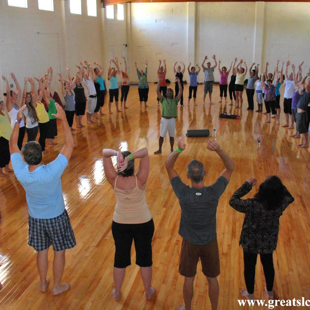 Group of people practicing yoga | Santosh Yoga Institute in Salt Lake City, UT