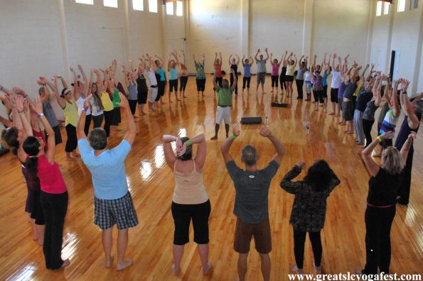 Group of people practicing yoga | Santosh Yoga Institute in Salt Lake City, UT