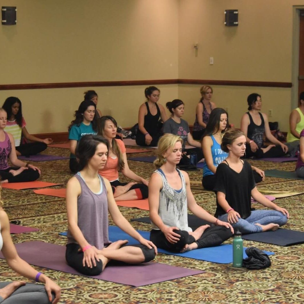 Group of people practicing yoga | Santosh Yoga Institute in Salt Lake City, UT