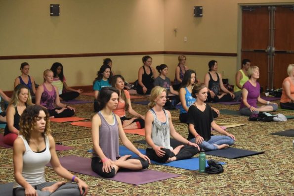 Group of people practicing yoga | Santosh Yoga Institute in Salt Lake City, UT