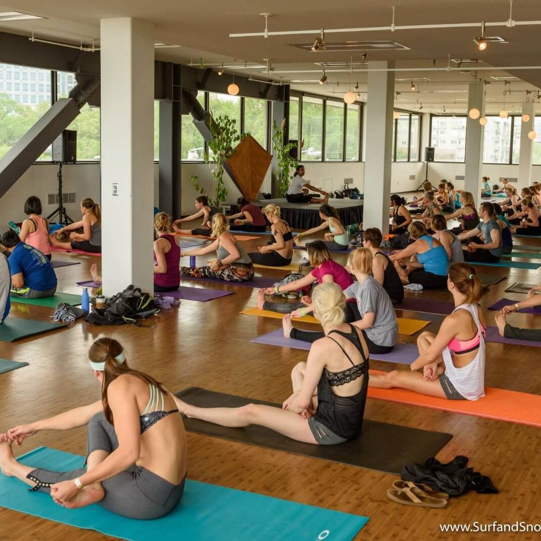 Group of people taking yoga sessions | Santosh Yoga Institute in Salt Lake City, UT