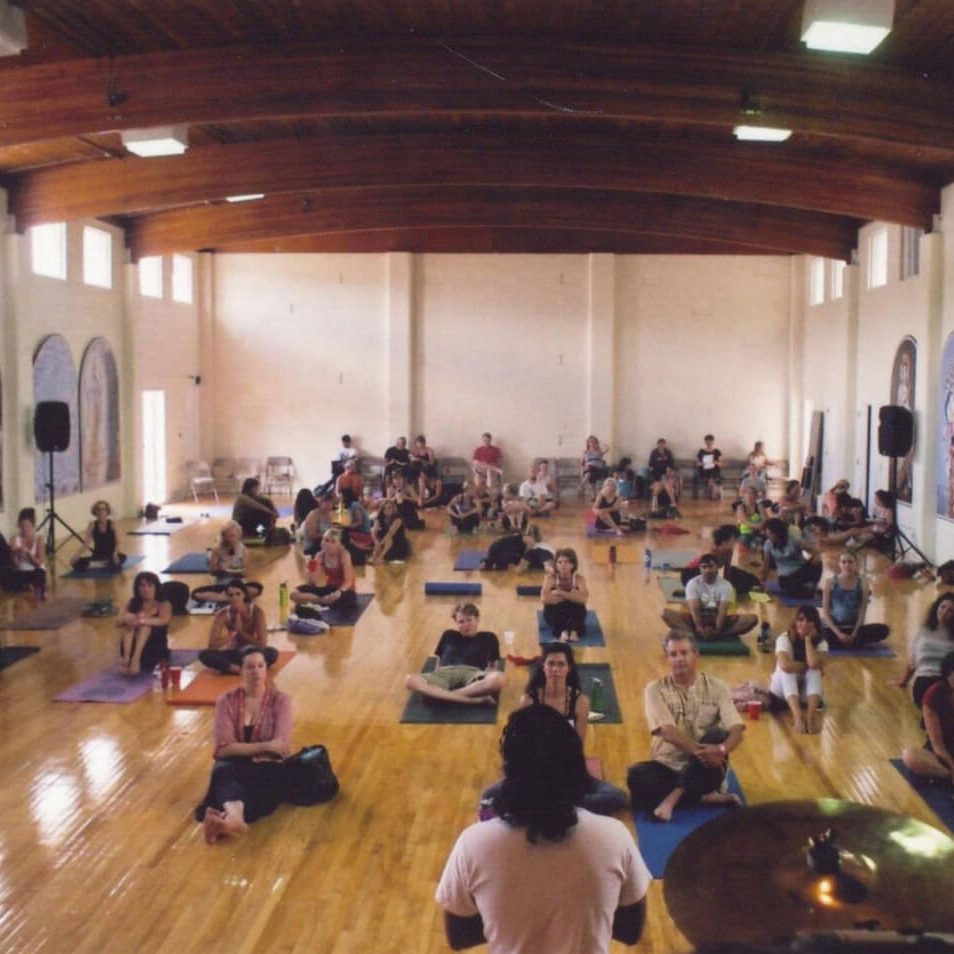 Group of people taking yoga training sessions | Santosh Yoga Institute in Salt Lake City, UT