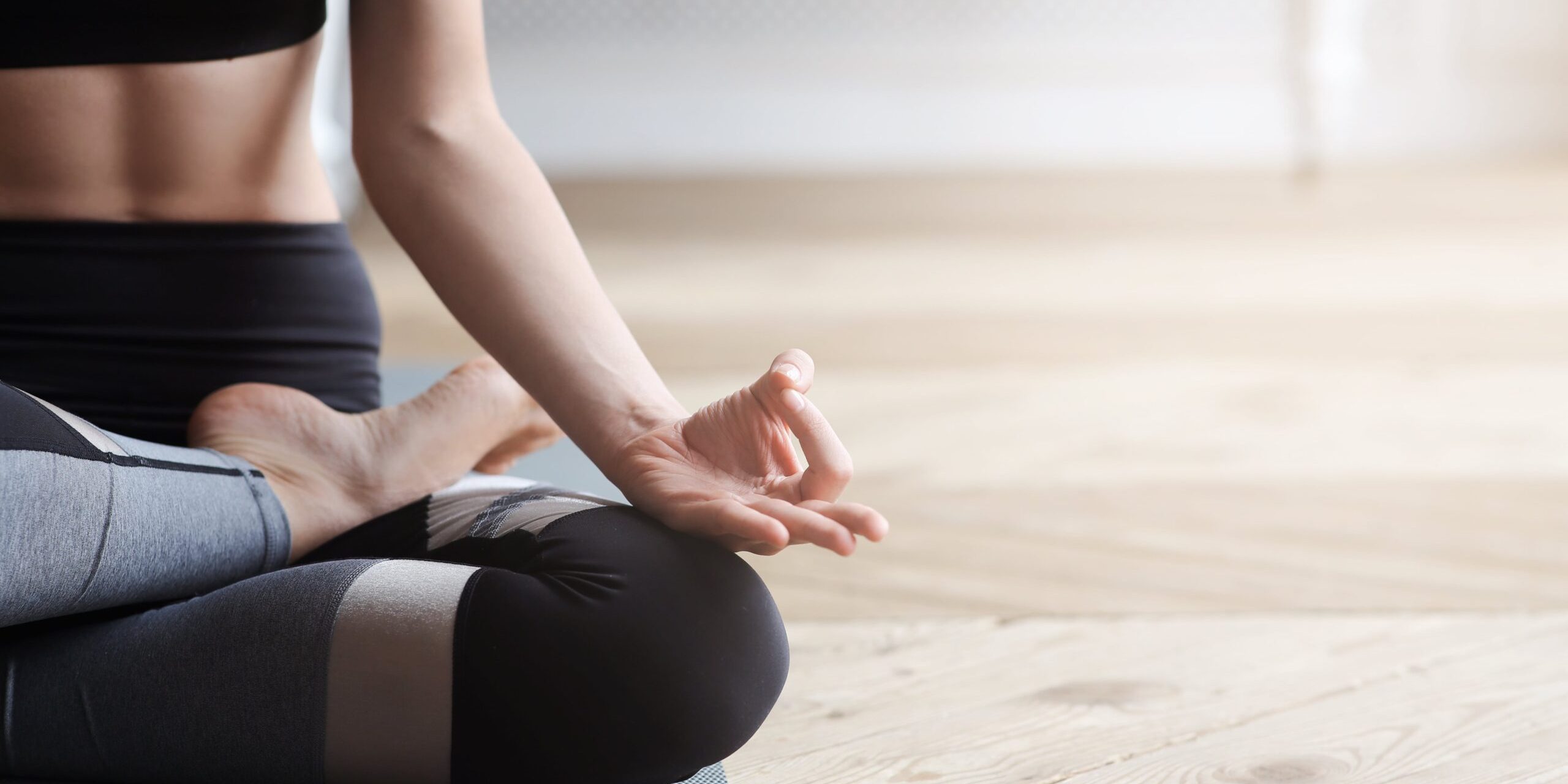 Young female doing yoga | Santosh Yoga Institute in Salt Lake City, UT