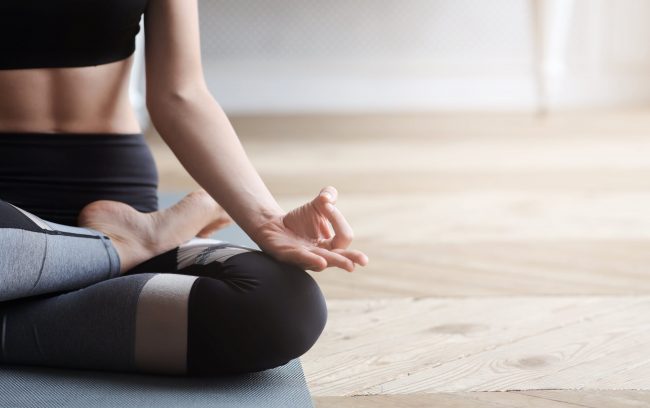 Young female doing yoga | Santosh Yoga Institute in Salt Lake City, UT