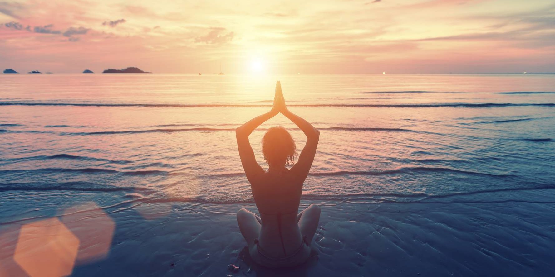 Woman yoga photo on a beautiful beach in Salt Lake City, UT | Santosh Yoga Institute