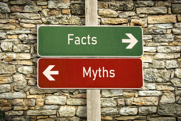 Facts & myths greet & red signboard in Salt Lake City, UT | Santosh Yoga Institute