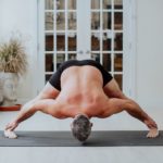 Man doing yoga wearing hugger-mugger-shorts in Salt Lake City, UT | Santosh Yoga Institute