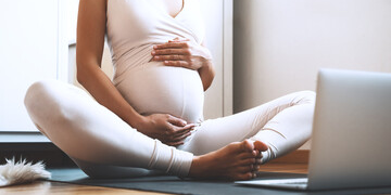 Young woman doing yoga for Healthy Pregnancy in Salt Lake City, UT | Santosh Yoga Institute
