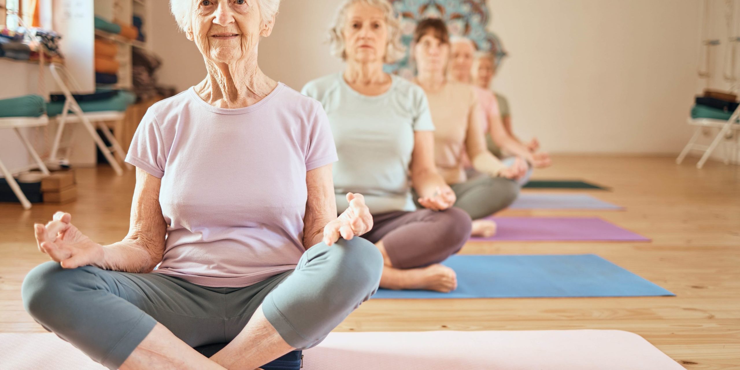 Group of old ladies sitting and doing meditation in Salt Lake City, UT | Santosh Yoga Institute