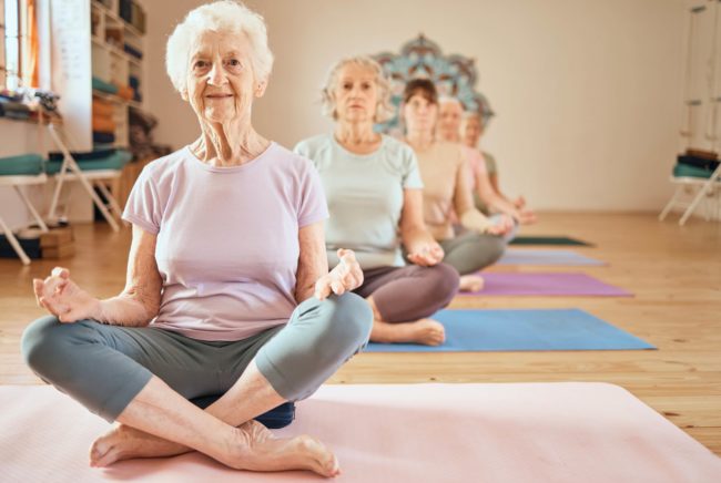 Group of old ladies sitting and doing meditation in Salt Lake City, UT | Santosh Yoga Institute