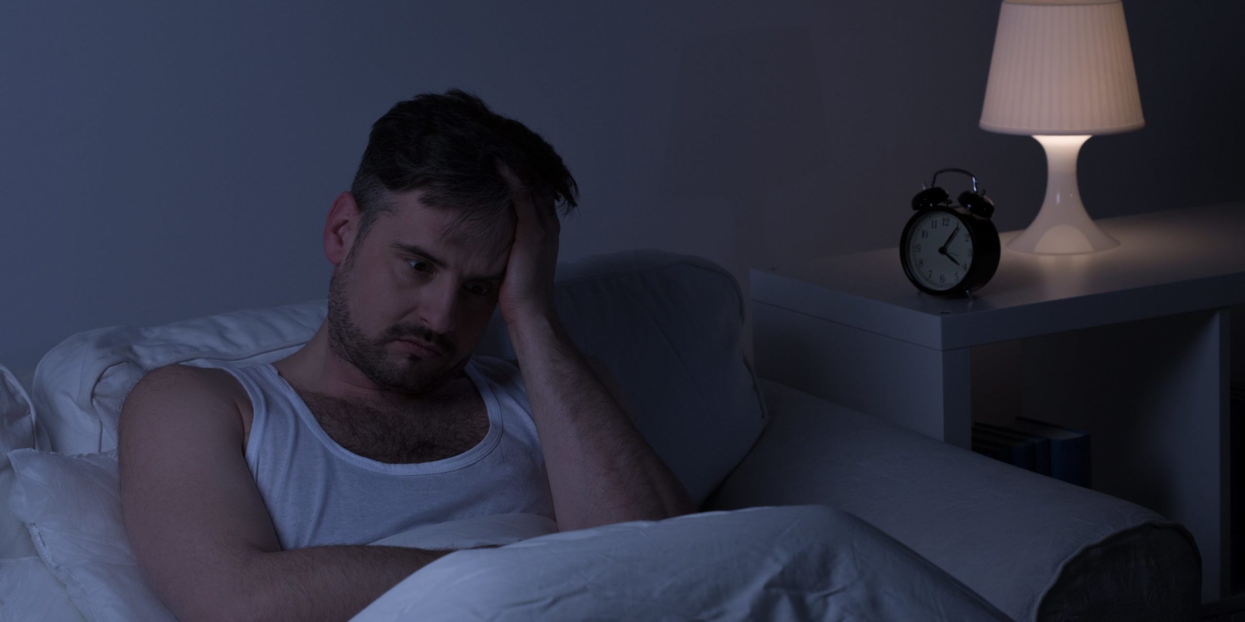 Stressed man not getting sleep at night in Salt Lake City, UT | Santosh Yoga Institute