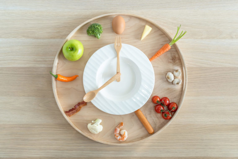 Photo of healthy foods arranged like a clock on a plate in Salt Lake City, UT | Santosh Yoga Institute