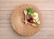 Healthy food clock. in wooden table in Salt Lake City, UT | Santosh Yoga Institute