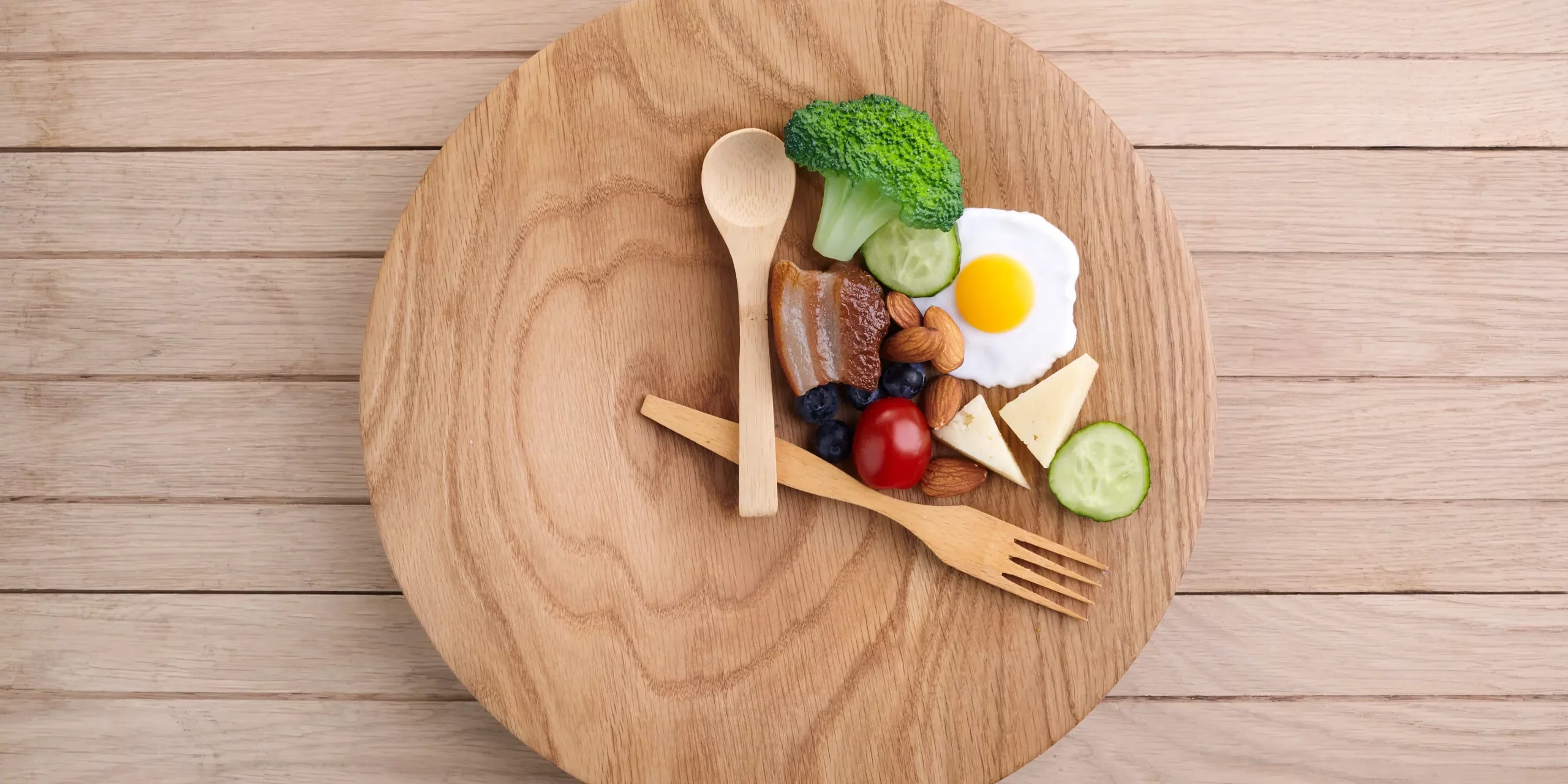 Healthy food clock. in wooden table in Salt Lake City, UT | Santosh Yoga Institute