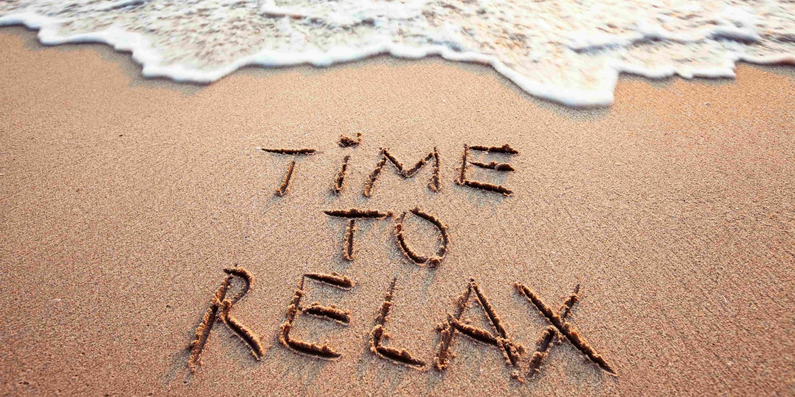 Time to relax text on the beach in Salt Lake City, UT | Santosh Yoga Institute