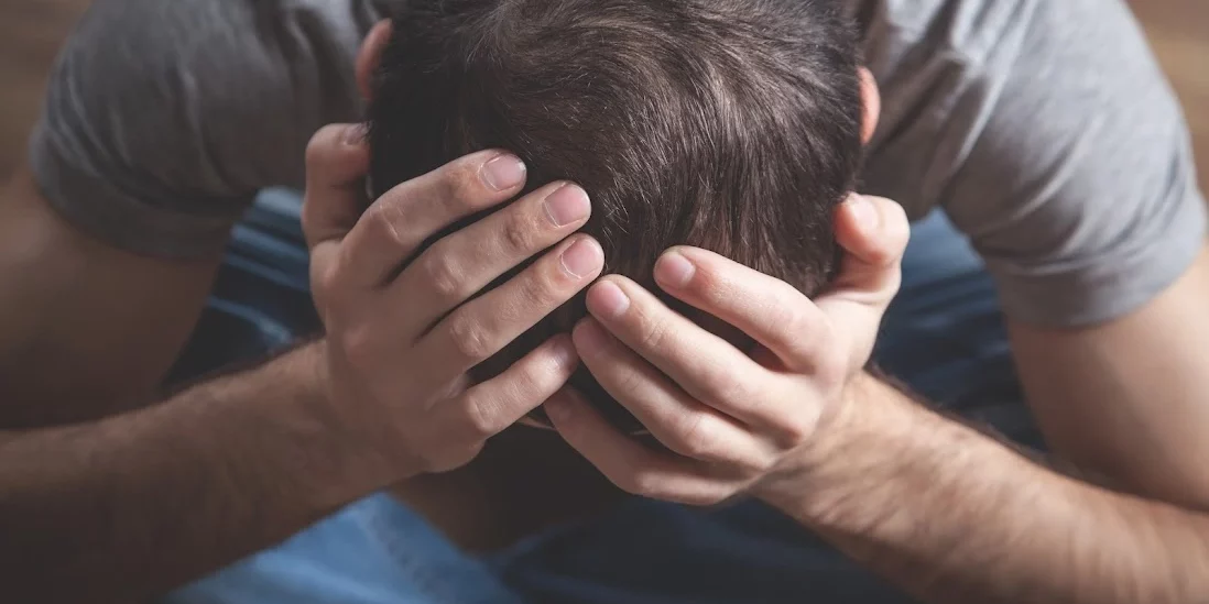 Young stressed man in Salt Lake City, UT | Santosh Yoga Institute