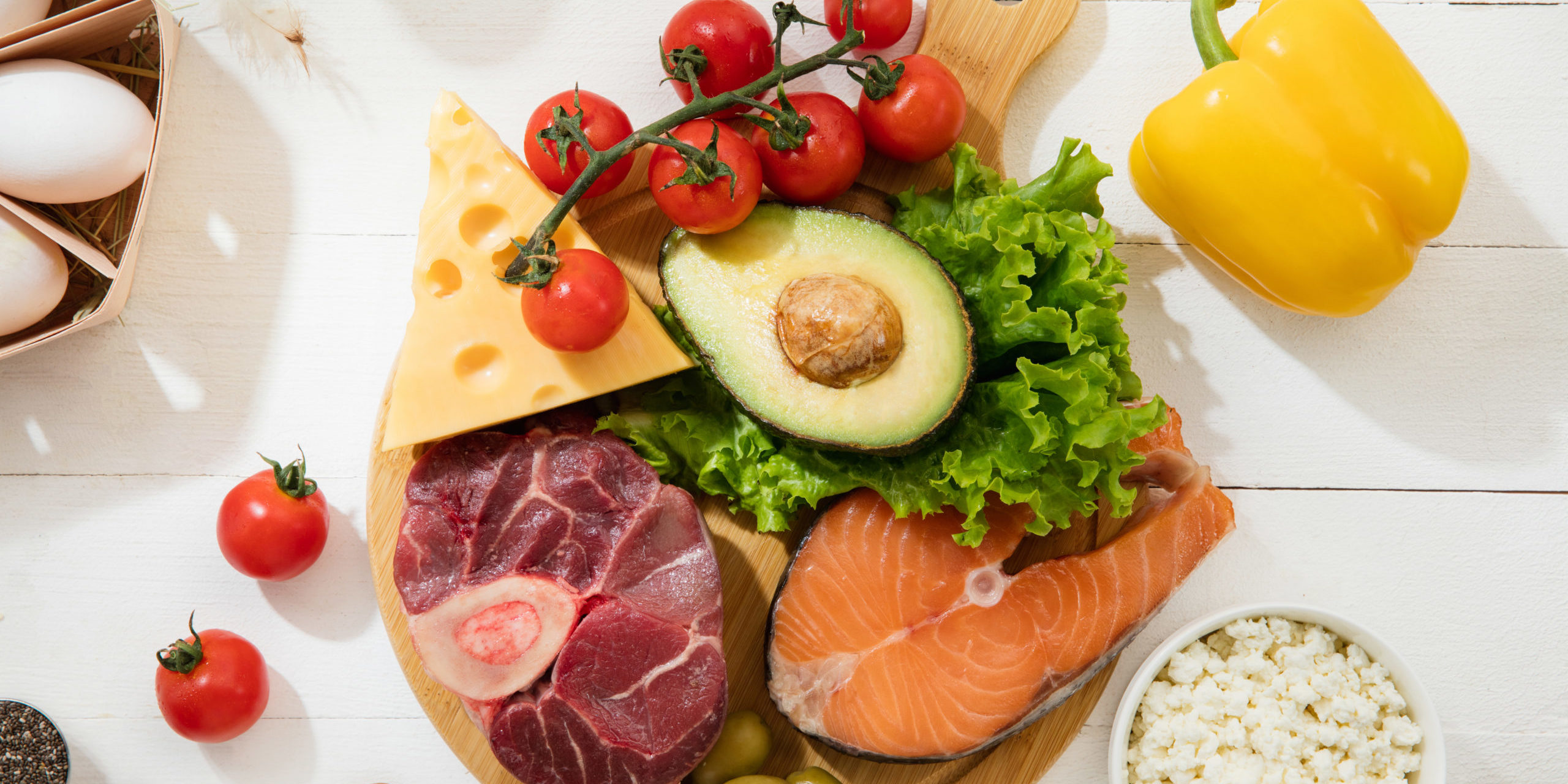 Meat, fish and vegetables. food selection on white background in Salt Lake City, UT | Santosh Yoga Institute