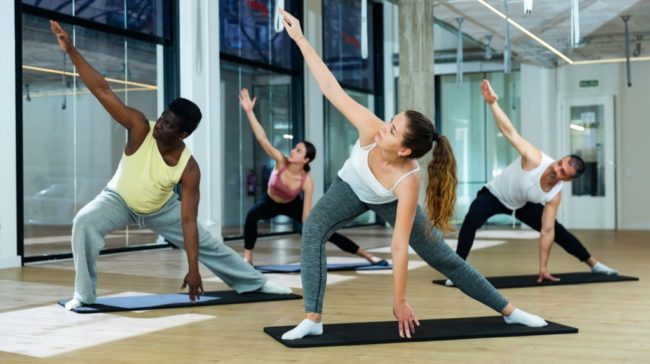 Group of young teenagers doing yoga in Salt Lake City, UT | Santosh Yoga Institute