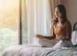 Young female doing meditation yoga in Salt Lake City, UT | Santosh Yoga Institute