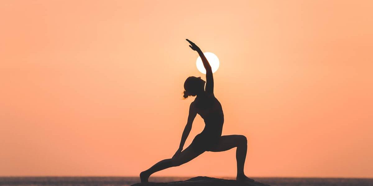 Warrior Pose by Santosh Yoga Institute in Salt Lake City UT